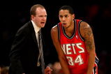 LOS ANGELES, CA - NOVEMBER 25:  Head coach Lawrence Frank and Devin Harris #34 of the New Jersey Nets confer during the game with the Los Angeles Lakers on November 25, 2008 at Staples Center in Los Angeles, California. The Lakers won 120-93.   NOTE TO USER: User expressly acknowledges and agrees that, by downloading and/or using this Photograph, user is consenting to the terms and conditions of the Getty Images License Agreement.  (Photo by Stephen Dunn/Getty Images)