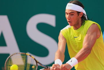 MONTE CARLO, MONACO - APRIL 20:  Rafael Nadal of Spain in action during his third round match against Kristof Vliegen of Belgium during the Rolex ATP Tennis Masters Monte Carlo at the The Monte Carlo Country Club on April 20, 2006 in Monte-Carlo, Monaco.  (Photo by Ian Walton/Getty Images)