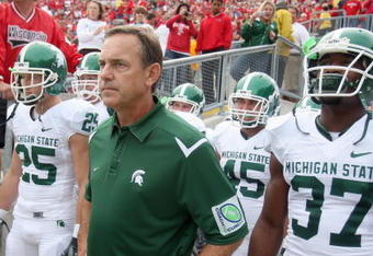 MADISON, WI - SEPTEMBER 26: Head coach Mark Dantonio of the Michigan State Spartans gets ready to lead his team onto the field before the game against the Wisconsin Badgers on September 26, 2009 at Camp Randall Stadium in Madison, Wisconsin. (Photo by Jonathan Daniel/Getty Images)