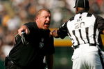 OAKLAND, CA - SEPTEMBER 27:  Oakland Raiders head coach Tom Cable argues with side judge Barry Anderson during their game against the Denver Broncos at the Oakland-Alameda County Coliseum on September 27, 2009 in Oakland, California.  (Photo by Ezra Shaw/Getty Images)