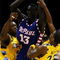 MILWAUKEE - JANUARY 24: Dwight Burke #12 (L) and Jerel McNeal #22 of the Marquette Golden Eagles trap Mac Koshwal #13 of the DePaul Blue Demons on March 24, 2009 at the Bradley Center in Milwaukee, Wisconsin. Marquette defeated DePaul 79-70. (Photo by Jonathan Daniel/Getty Images)