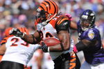 BALTIMORE - OCTOBER 11:  Cedric Benson #32 of the Cincinnati Bengals runs the ball against the Baltimore Ravens at M&T Bank Stadium on October 11, 2009 in Baltimore, Maryland. The Bengals defeated the Ravens 17-14. (Photo by Larry French/Getty Images)