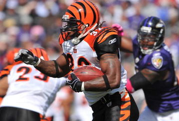 BALTIMORE - OCTOBER 11:  Cedric Benson #32 of the Cincinnati Bengals runs the ball against the Baltimore Ravens at M&T Bank Stadium on October 11, 2009 in Baltimore, Maryland. The Bengals defeated the Ravens 17-14. (Photo by Larry French/Getty Images)