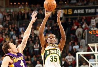 SEATTLE - JANUARY 14:  Kevin Durant #35 of the Seattle SuperSonics shoots the outside jump shot against Luke Walton #4 of the Los Angeles Lakers during the game at Key Arena on January 14, 2008 in Seattle, Washington.  The Lakers won 123-121.  NOTE TO USER: User expressly acknowledges and agrees that, by downloading and/or using this Photograph, user is consenting to the terms and conditions of the Getty Images License Agreement. (Photo by Otto Greule Jr/Getty Images)