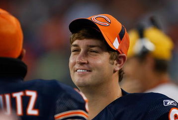 CHICAGO, IL - SEPTEMBER 3: Quarterback Jay Cutler #6 of the Chicago Bears talks with a team mate on the sidelines against the Cleveland Browns at Soldier Field on September 3, 2009 in Chicago, Illinois. (Photo by Scott Boehm/Getty Images)