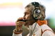 AUSTIN, TX - OCTOBER 10:  Head coach Mack Brown of the Texas Longhorns calls in a play against the Colorado Buffaloes on October 10, 2009 at Darrell K Royal-Texas Memorial Stadium in Austin, Texas.  Texas won 38-14.  (Photo by Brian Bahr/Getty Images)