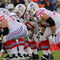 DENVER - OCTOBER 11:  Center Dan Koppen #67 of the New England Patriots prepares to snap the ball as the offensive line readies for pass protection against the Denver Broncos during NFL action at Invesco Field at Mile High on October 11, 2009 in Denver, Colorado. The Broncos defeated the Patriots 20-17 in overtime.  (Photo by Doug Pensinger/Getty Images)