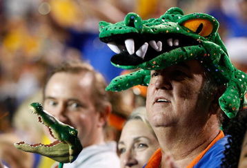 BATON ROUGE, LA - OCTOBER 10:  A fan of the Florida Gators cheers during the game against the Louisiana State University Tigers at Tiger Stadium on October 10, 2009 in Baton Rouge, Louisiana.  (Photo by Kevin C. Cox/Getty Images)