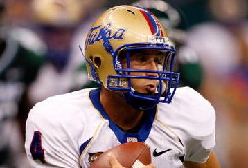 NEW ORLEANS - SEPTEMBER 04:  Quarterback G.J. Kinne #4 of the Tulsa Golden Hurricanes scrambles with the football against the Tulane Green Wave at the Louisiana Superdome on September 4, 2009 in New Orleans, Louisiana.   The Hurricanes defeated the Green Wave 37-13.  (Photo by Chris Graythen/Getty Images)