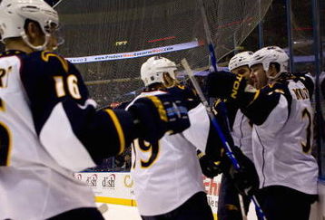 ST. LOUIS, MO - OCTOBER 8: Marc Popovic #3 of the Atlanta Thrashers celebrates a goal against the St. Louis Blues with his teammates at the Scottrade Center on October 8, 2009 in St. Louis, Missouri.  The Thrashers beat the Blues 4-2.  (Photo by Dilip Vishwanat/Getty Images)