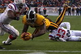 DENVER - OCTOBER 11:  Brandon Marshall #15 of the Denver Broncos scores a touchdown to tie the game in the fouth quarter against the New England Patriots during an NFL game at Invesco Field at Mile High on October 11, 2009 in Denver, Colorado.  (Photo by Jed Jacobsohn/Getty Images)