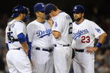 LOS ANGELES, CA - OCTOBER 15:  Manager Joe Torry, Russell Martin #55, pitcher Clayton Kershaw #22 and Casey Blake #23 of the Los Angeles Dodgers have a meeting on the mound in the fifth inning of Game One of the NLCS against the Philadelphia Phillies during the 2009 MLB Playoffs at Dodger Stadium on October 15, 2009 in Los Angeles, California.  (Photo by Kevork Djansezian/Getty Images)