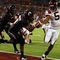 MIAMI - JANUARY 01:  Tyrod Taylor #5 of the Virginia Tech Hokies runs the ball for a toucdown against Brandon Underwood #8 of the Cincinnati Bearcats during the FedEx Orange Bowl against at Dolphin Stadium on January 1, 2009 in Miami, Florida.  (Photo by Doug Benc/Getty Images)