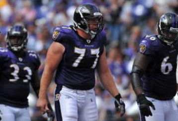 BALTIMORE - SEPTEMBER 27:  Matt Birk #77 of the Baltimore Ravens sets up at the line of scrimmage during the game against the Cleveland Browns at M&T Bank Stadium on September 27, 2009 in Baltimore, Maryland. The Ravens defeated the Browns 34-3. (Photo by Larry French/Getty Images)