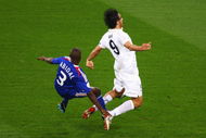 ZURICH, SWITZERLAND - JUNE 17:  Eric Abidal of France tackles Luca Toni of Italy to give Italy a penalty during the UEFA EURO 2008 Group C match between France and Italy at Letzigrund Stadion on June 17, 2008 in Zurich, Switzerland.  (Photo by Ian Walton/Getty Images)