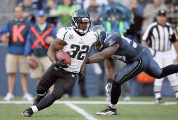 SEATTLE - OCTOBER 11:  Maurice Jones -Drew #32 of the Jacksonville Jaguars carries the ball during the game against the Seattle Seahawks on October 11, 2009 at Qwest Field in Seattle, Washington.The Seahawks defeated the Jaguars 41-0.  (Photo by Otto Greule Jr/Getty Images)    