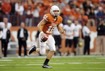 AUSTIN, TX - OCTOBER 10:  Quarterback Colt McCoy #12 of the Texas Longhorns looks for a receiver against the Colorado Buffaloes on October 10, 2009 at Darrell K Royal-Texas Memorial Stadium in Austin, Texas.  Texas won 38-14.  (Photo by Brian Bahr/Getty Images)