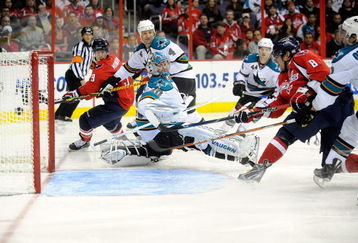 WASHINGTON - OCTOBER 15:  Alex Ovechkin #8 of the Washington Capitals scores a goal in the second period against Evgeni Nabokov #20 of the San Jose Sharks at the Verizon Center on October 15, 2009 in Washington, DC.  (Photo by Greg Fiume/Getty Images)