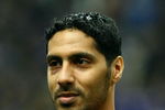 SAITAMA, JAPAN - MARCH 28:  Mohamed Salmeen of Bahrain lines up for national anthems during the 2010 FIFA World Cup Asian qualifier match between Japan and Bahrain at Saitama Stadium on March 28, 2009 in Saitama, Japan.  (Photo by Junko Kimura/Getty Images)