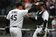 CHICAGO - APRIL 29:  Bobby Jenks #45 of the Chicago White Sox congratulates teammate A.J. Pierzynski #12 after a win against the Seattle Mariners on April 29, 2009 at U.S. Cellular Field in Chicago, Illinois. The White Sox defeated the Mariners 6-3. (Photo by Jonathan Daniel/Getty Images)