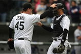 CHICAGO - APRIL 29:  Bobby Jenks #45 of the Chicago White Sox congratulates teammate A.J. Pierzynski #12 after a win against the Seattle Mariners on April 29, 2009 at U.S. Cellular Field in Chicago, Illinois. The White Sox defeated the Mariners 6-3. (Photo by Jonathan Daniel/Getty Images)