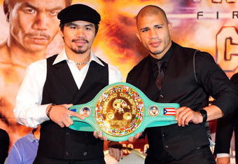 BEVERLY HILLS, CA - SEPTEMBER 14:  Manny Pacquiao and  Miguel Cotto pose for pictures during the press conference at the Beverly Hills Hotel on September 14, 2009 in Beverly Hills, California.  (Photo by Jacob de Golish/Getty Images)