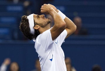SHANGHAI, CHINA - OCTOBER 16:  Feliciano Lopez of Spain celebrates match point against Robin Soderling of Sweden during day six of 2009 Shanghai ATP Masters 1000 at Qi Zhong Tennis Centre on October 16, 2009 in Shanghai, China.  (Photo by Victor Fraile/Getty Images)