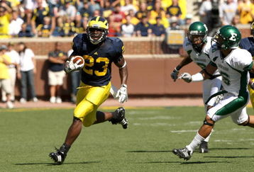 ANN ARBOR, MI - SEPTEMBER 19:  Running back Carlos Brown #23 of the Michigan Wolverines carries the ball against the Eastern Michigan Eagles at Michigan Stadium on September 19, 2009 in Ann Arbor, Michigan.  (Photo by Stephen Dunn/Getty Images)