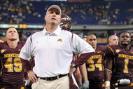 MINNEAPOLIS - NOVEMBER 01:  Head Coach Tim Brewster of the Minnesota Golden Gophers and his players react to a 24-17 loss to the Northwestern Wildcats during the fourth quarter at the Hubert H.Humphrey Metrodome on November 1, 2008 in Minneapolis, Minnesota. (Photo by Harry How/Getty Images)
