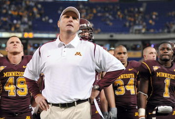MINNEAPOLIS - NOVEMBER 01:  Head Coach Tim Brewster of the Minnesota Golden Gophers and his players react to a 24-17 loss to the Northwestern Wildcats during the fourth quarter at the Hubert H.Humphrey Metrodome on November 1, 2008 in Minneapolis, Minnesota. (Photo by Harry How/Getty Images)