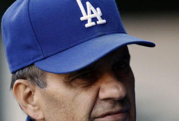 ST. LOUIS, MO - OCTOBER 10:  Manager Joe Torre of the Los Angeles Dodgers waits for the start of Game Three of the NLDS against the St. Louis Cardinals during the 2009 MLB Playoffs at Busch Stadium on October 10, 2009 in St Louis, Missouri. (Photo by Ronald Martinez/Getty Images)
