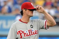 LOS ANGELES, CA - OCTOBER 15: Pitcher Cole Hamels #35 of the Philadelphia Phillies reacts after allowing a solo home run by James Loney #7 (not pictured) of the Los Angeles Dodgers in the second inning of Game One of the NLCS during the 2009 MLB Playoffs at Dodger Stadium on October 15, 2009 in Los Angeles, California. (Photo by Harry How/Getty Images)