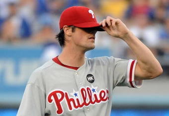 LOS ANGELES, CA - OCTOBER 15:  Pitcher Cole Hamels #35 of the Philadelphia Phillies reacts after allowing a solo home run by James Loney #7 (not pictured) of the Los Angeles Dodgers in the second inning of Game One of the NLCS during the 2009 MLB Playoffs at Dodger Stadium on October 15, 2009 in Los Angeles, California.  (Photo by Harry How/Getty Images)