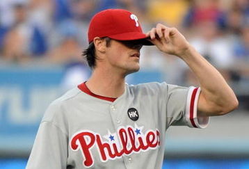 LOS ANGELES, CA - OCTOBER 15:  Pitcher Cole Hamels #35 of the Philadelphia Phillies reacts after allowing a solo home run by James Loney #7 (not pictured) of the Los Angeles Dodgers in the second inning of Game One of the NLCS during the 2009 MLB Playoffs at Dodger Stadium on October 15, 2009 in Los Angeles, California.  (Photo by Harry How/Getty Images)