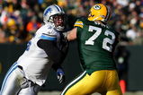 GREEN BAY, WI - DECEMBER 28: Shaun Cody #75 of the Detroit Lions rushes against Jason Spitz #72 of the Green Bay Packers on December 28, 2008 at Lambeau Field in Green Bay, Wisconsin. The Packers defeated the Lions 31-21. (Photo by Jonathan Daniel/Getty Images)