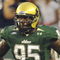 TAMPA, FL - SEPTEMBER 12: Defensive end George Selvie #95 of the University of South Florida Bulls watches play against the Kansas University Jayhawks at Raymond James Stadium on September 12, 2008 in Tampa, Florida.  (Photo by Al Messerschmidt/Getty Images) 
