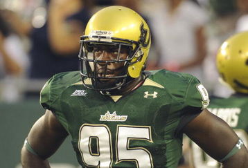 TAMPA, FL - SEPTEMBER 12: Defensive end George Selvie #95 of the University of South Florida Bulls watches play against the Kansas University Jayhawks at Raymond James Stadium on September 12, 2008 in Tampa, Florida.  (Photo by Al Messerschmidt/Getty Images) 