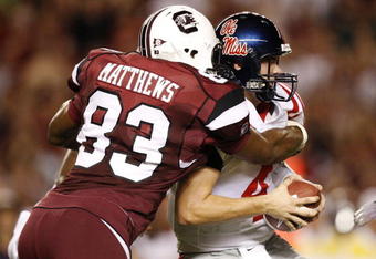 COLUMBIA, SC - SEPTEMBER 24:  Defensive end Cliff Matthews #83 of the South Carolina Gamecocks sacks quarterback Jevan Snead #4 of the Mississippi Rebels during their game at Williams-Brice Stadium on September 24, 2009 in Columbia, South Carolina. (Photo by Streeter Lecka/Getty Images)