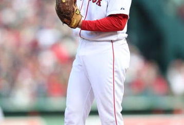BOSTON - OCTOBER 11:  Pitcher Jonathan Papelbon #58 of the Boston Red Sox prepares to pitch against the Los Angeles Angels of Anaheim in the eighth inning of Game Three of the ALDS during the 2009 MLB Playoffs at Fenway Park on October 11, 2009 in Boston, Massachusetts. (Photo by Elsa/Getty Images)