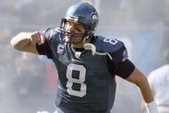 SEATTLE - OCTOBER 11: Quarterback Matt Hasselbeck #8 of the Seattle Seahawks celebrates as he runs onto the field before the game against the Jacksonville Jaguars on October 11, 2009 at Qwest Field in Seattle, Washington. The Seahawks defeated the Jaguars 41-0. (Photo by Otto Greule Jr/Getty Images)  