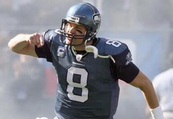 SEATTLE - OCTOBER 11: Quarterback Matt Hasselbeck #8 of the Seattle Seahawks celebrates as he runs onto the field before the game against the Jacksonville Jaguars on October 11, 2009 at Qwest Field in Seattle, Washington. The Seahawks defeated the Jaguars 41-0. (Photo by Otto Greule Jr/Getty Images)  