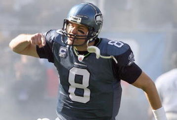 SEATTLE - OCTOBER 11: Quarterback Matt Hasselbeck #8 of the Seattle Seahawks celebrates as he runs onto the field before the game against the Jacksonville Jaguars on October 11, 2009 at Qwest Field in Seattle, Washington. The Seahawks defeated the Jaguars 41-0. (Photo by Otto Greule Jr/Getty Images)  