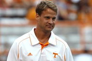 KNOXVILLE, TN - SEPTEMBER 12: Lane Kiffin, head coach of the Tennessee Volunteers during pregame warmups against the UCLA Bruins on September 12, 2009 at Neyland Stadium in Knoxville, Tennessee. UCLA beat Tennessee 19-15. (Photo by Joe Murphy/Getty Images)