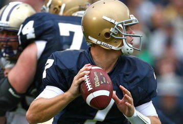 SOUTH BEND, IN - OCTOBER 03: Jimmy Clausen #7 of the Notre Dame Fighting Irish looks for a receiver against the Washington Huskies on October 3, 2009 at Notre Dame Stadium in South Bend, Indiana. Notre Dame defeated Washington 37-30 in overtime. (Photo by Jonathan Daniel/Getty Images)