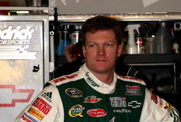 FONTANA, CA - OCTOBER 09:  Dale Earnhardt Jr., driver of the #88 AMP Energy/National Guard Chevrolet, stands in the garage during practice for the NASCAR Sprint Cup Series Pepsi 500 at Auto Club Speedway on October 9, 2009 in Fontana, California.  (Photo by Stephen Dunn/Getty Images)