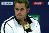 SHANGHAI, CHINA - OCTOBER 13:  Andy Roddick of the United States fields questions from the media at a press conference after retiring from his match against Stanilas Wawrinka of Switzerland during the 2009 Shanghai ATP Masters 1000 at Qi Zhong Tennis Centre on October 13, 2009 in Shanghai, China.  (Photo by Matthew Stockman/Getty Images)