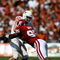 DALLAS - OCTOBER 11:  Quarterback Colt McCoy #12 of the Texas Longhorns is tackled by Alan Davis #95 of the Oklahoma Sooners during the Red River Rivalry at the Cotton Bowl on October 11, 2008 in Dallas, Texas.  (Photo by Ronald Martinez/Getty Images)