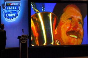 CHARLOTTE, NC - OCTOBER 14: Nascar President and CEO Brian France watch as Dale Earnhardt is selected to the Nascar Hall of Fame on October 14, 2009 in Charlotte, North Carolina.(Photo by John Harrelson/Getty Images for NASCAR)  