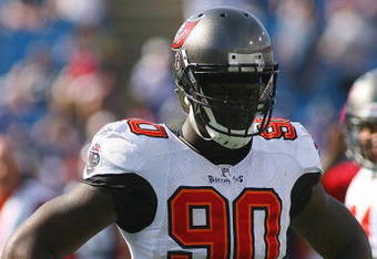 ORCHARD PARK, NY - SEPTEMBER 20:  Defensive end Gaines Adams #90 of the Tampa Bay Buccaneers takes a break from the action during the game against the Buffalo Bills at Ralph Wilson Stadium on September 20, 2009 in Orchard Park, New York.  The Bills won 33-20.  (Photo by Rick Stewart/Getty Images)