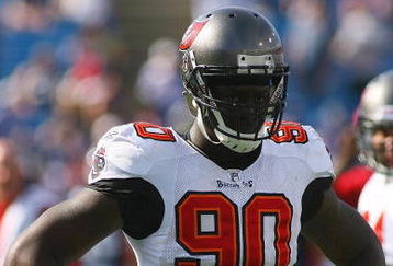 ORCHARD PARK, NY - SEPTEMBER 20:  Defensive end Gaines Adams #90 of the Tampa Bay Buccaneers takes a break from the action during the game against the Buffalo Bills at Ralph Wilson Stadium on September 20, 2009 in Orchard Park, New York.  The Bills won 33-20.  (Photo by Rick Stewart/Getty Images)